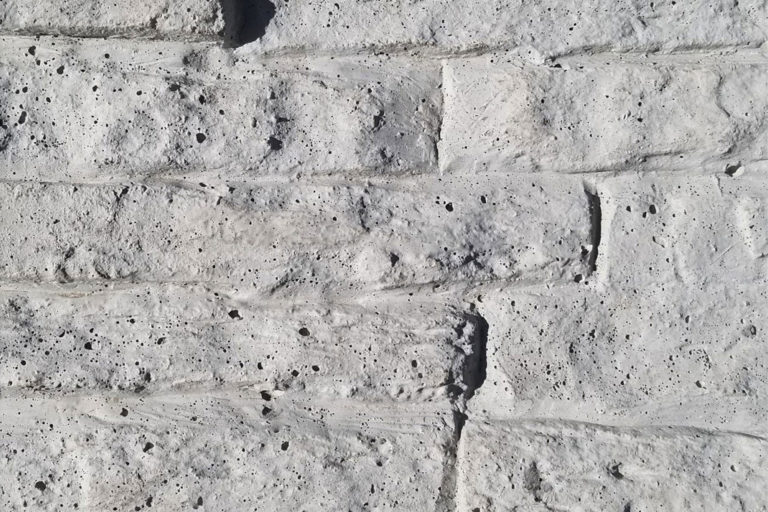 Gray concrete fence sample