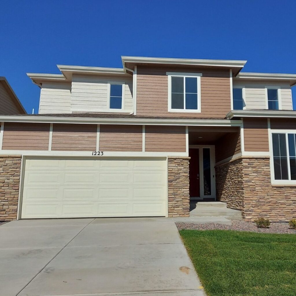 home with stone veneer siding