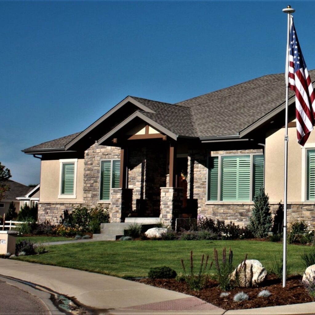 house with stone veneer siding